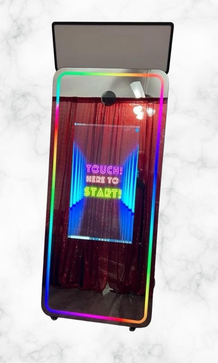 The Reflections Mirror photo booth with LED frame and interactive touch screen, available in Philadelphia
