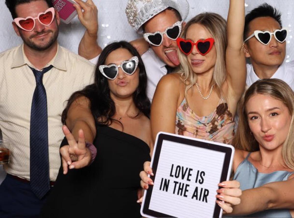 Wedding guests with heart sunglasses in a Philadelphia photo booth